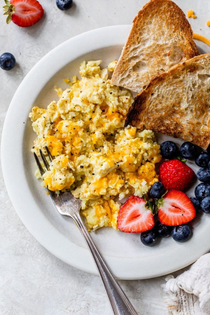 Scrambled-eggs-toast-fruit